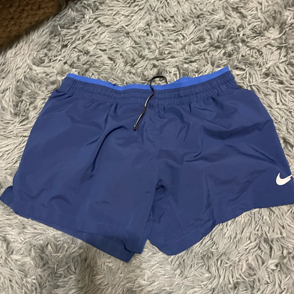 Blue Nike shorts
